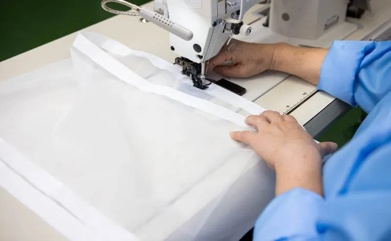 Scene of sewing processing mesh cloth